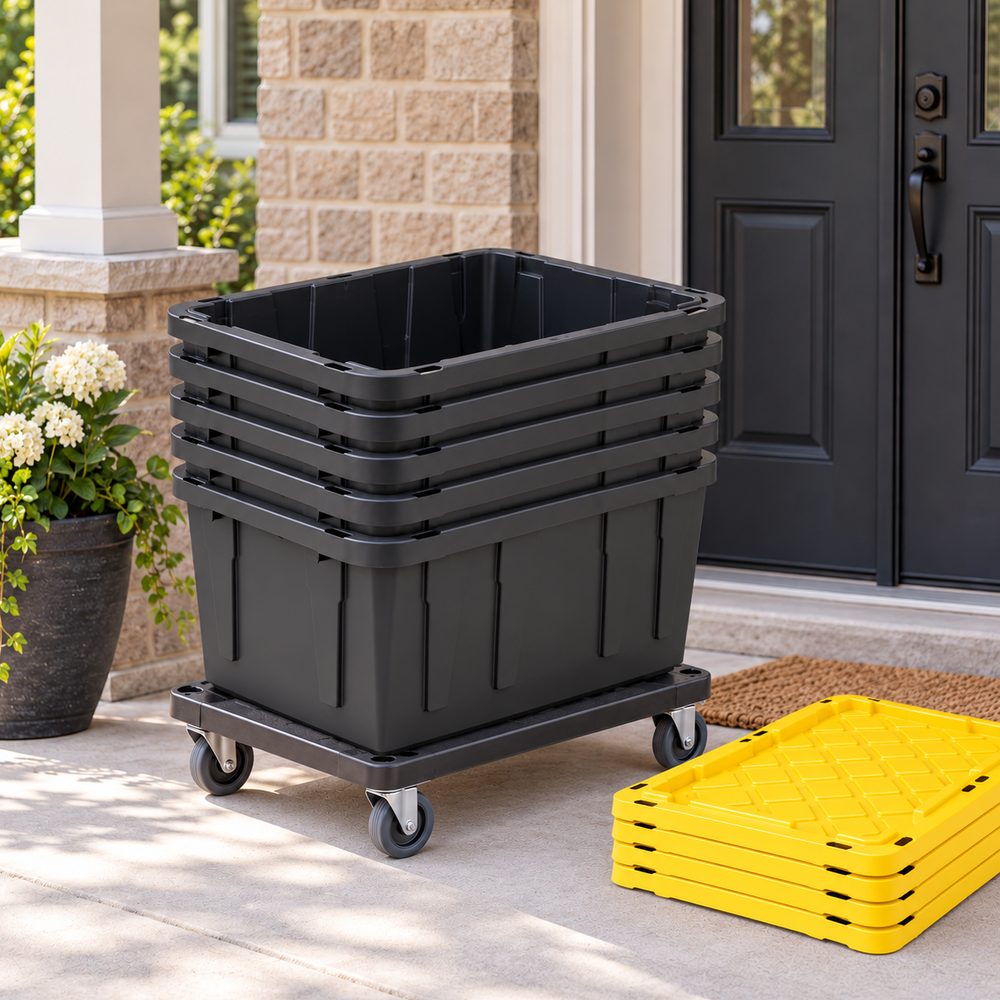 Empty black totes stacked on a rolling dolly beside a front door, with yellow lids stacked next to them